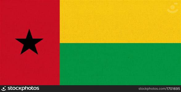 flag of Guinea-Bissau. National Guinea-Bissau flag on fabric surface. Guinea-Bissau national flag on textured background. Fabric Texture. flag of Guinea-Bissau. National flag on fabric surface