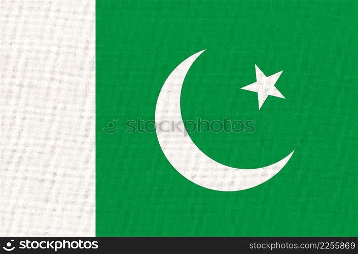 Flag of Islamic Republic of Pakistan. Pakistan flag on fabric surface. Fabric Texture. National symbol of Pakistan. Flag of Islamic Republic of Pakistan. Pakistan flag on fabric surface
