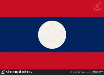 Flag of Laos. Laotian flag on fabric surface. Fabric Texture. Lao People Democratic Republic. Lao state symbol. Lao People Democratic Republic. Flag of Laos. Laotian flag