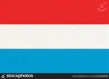 Flag of Luxembourg. Grand Duchy of Luxembourg. Luxembourg state symbol. flag on fabric surface. Fabric Texture. Luxembourg state symbol. National symbol. Three ribbons.. Flag of Luxembourg. Grand Duchy of Luxembourg. National symbol. Three ribbons