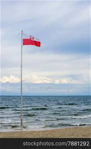 Flag of Poland at the Baltic Sea