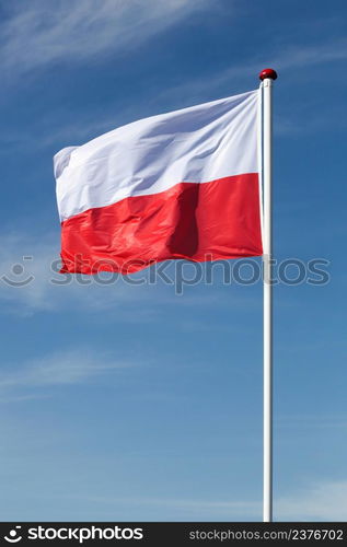 Flag of Poland waving in the sky