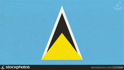 Flag of Saint Lucia. Saint Lucia flag on fabric surface. Fabric Texture. National symbol. Caribbean country.. Flag of Saint Lucia. Caribbean country. National symbol