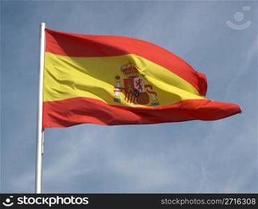 Flag of Spain over a blue sky. Flag of Spain