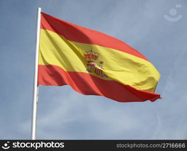 Flag of Spain over a blue sky. Flag of Spain