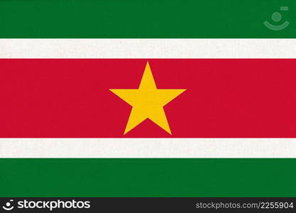 Flag of Suriname. Surinamese flag on fabric surface. Fabric Texture. National symbol. Republic of Suriname. Surinamese national flag. Flag of Suriname on fabric texture. Surinamese national flag