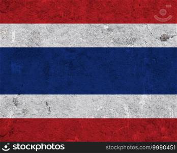 Flag of Thailand on weathered concrete