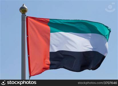 Flag of United Arab Emirates on a sky