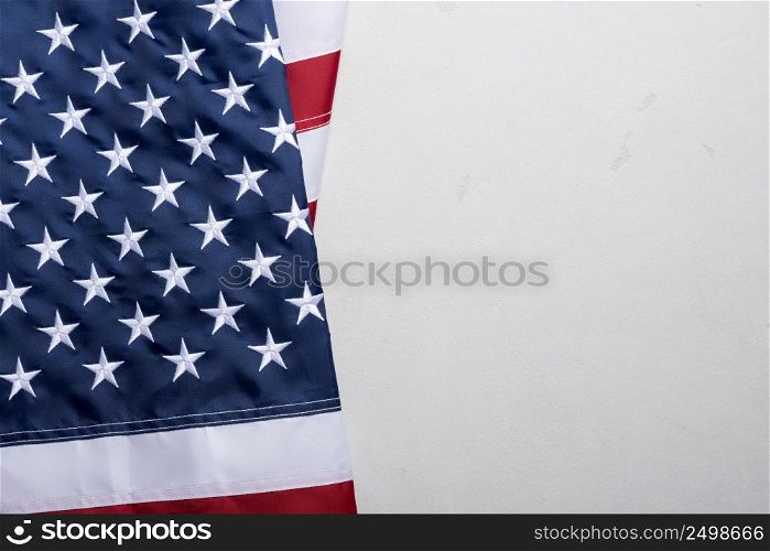 Flag of United States of America on stucco table top view