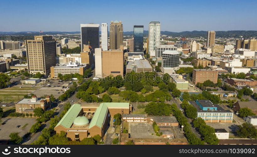 Flags fly over the rooftops and street of the southern downtown Birmingham Alabama