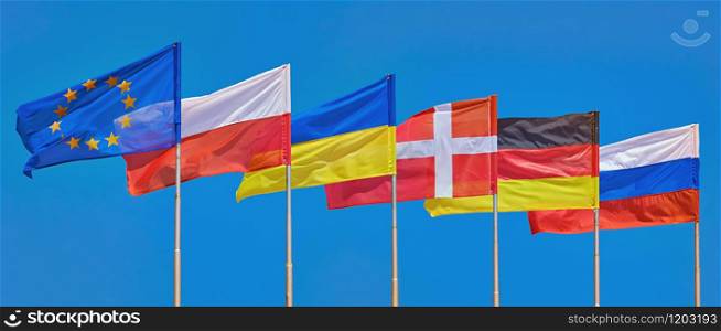 Flags of Different Countries on a Background of Blue Sky. Flags of Different Countries