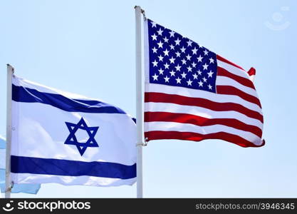Flags of USA and Israel in the wind close-up