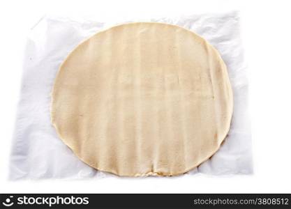 flaky pastry in front of white background