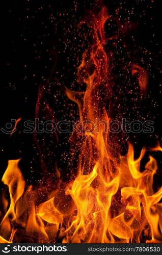 flame and sparks isolated over black background