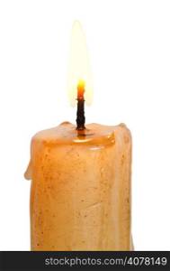 flame on lighted candle close up isolated on white background