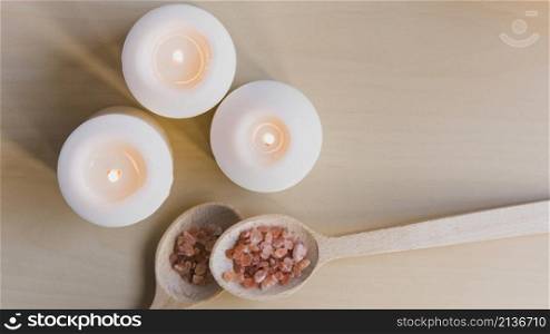flaming candles near salt