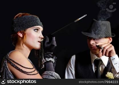 flapper girl smoking and young gangster in hat