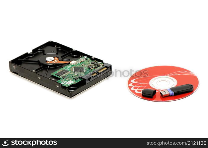 flash memory, computer disk and hard disk isolated on a white background