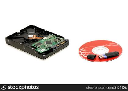 flash memory, computer disk and hard disk isolated on a white background