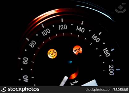 Flashing ABS symbol on dashboard of modern motorcycle. Close-up view. Motorbike, transport mode, speed concept. High quality photo. Flashing ABS symbol on dashboard of modern motorcycle. Close-up view. Motorbike, transport mode, speed concept.