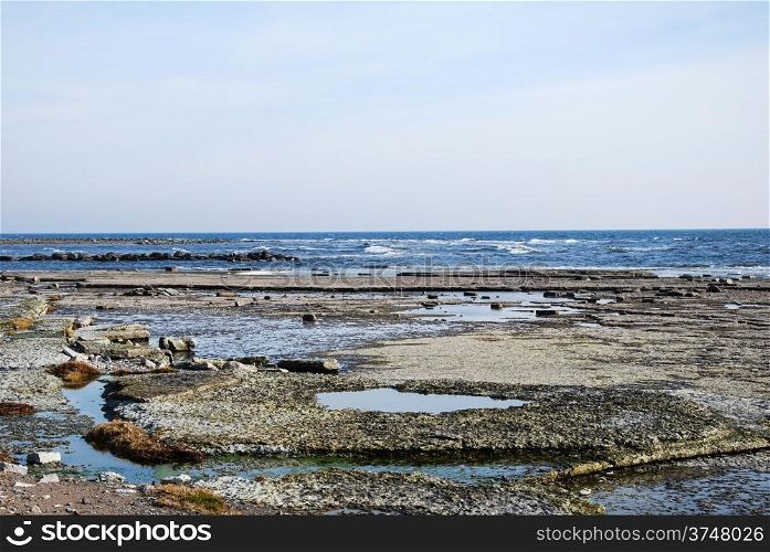 Flat and rocky coastline by the Baltic Sea at the swedish island Oland