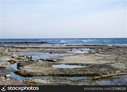 Flat and rocky coastline by the Baltic Sea at the swedish island Oland