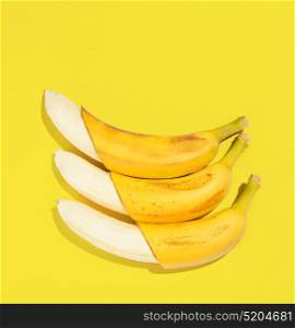 Flat banana background. Fresh bananas on yellow background, view from above