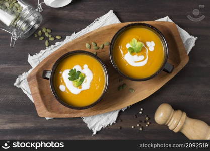 flat lat bowls with pumpkin soup