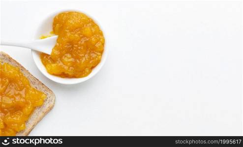 flat lay apricots jam bread