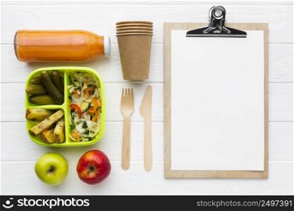 flat lay arrangement different foods with empty clipboard