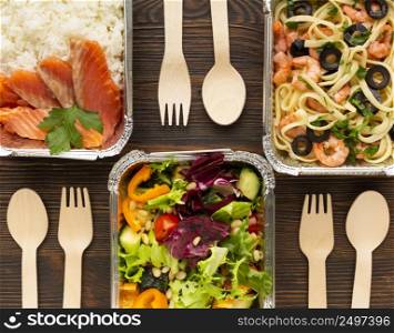 flat lay arrangement with different meals wooden table