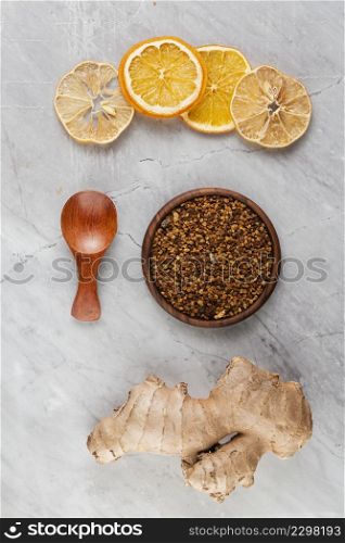 flat lay arrangement with orange slices turmeric