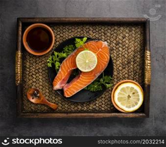 flat lay arrangement with salmon lemon