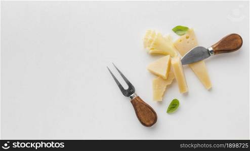 flat lay assortment gourmet cheese cheese knives with copy space. Resolution and high quality beautiful photo. flat lay assortment gourmet cheese cheese knives with copy space. High quality beautiful photo concept