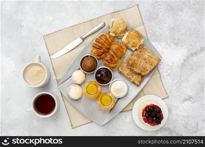 flat lay assortment with delicious breakfast cappuccino