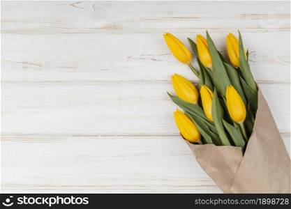 flat lay assortment yellow tulips with copy space. Resolution and high quality beautiful photo. flat lay assortment yellow tulips with copy space. High quality beautiful photo concept