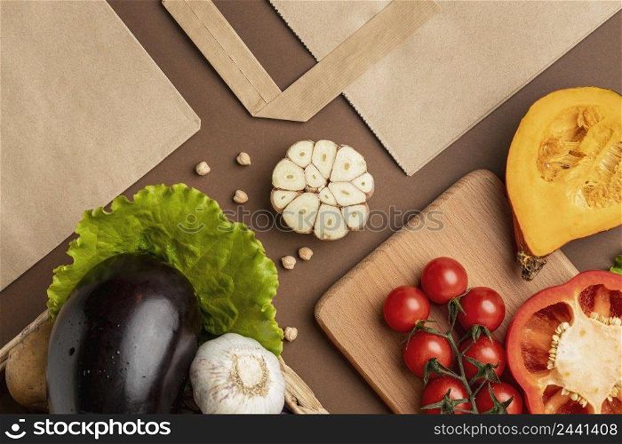 flat lay basket organic vegetables with paper bag