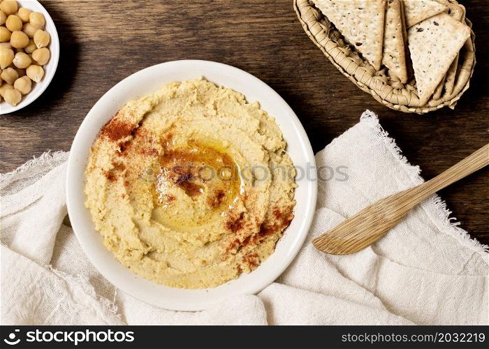 flat lay bowl hummus with chickpeas
