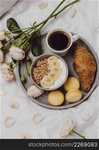 flat lay breakfast bowl with cereal macarons