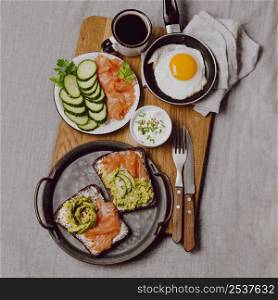 flat lay breakfast sandwiches bed with fried egg toast