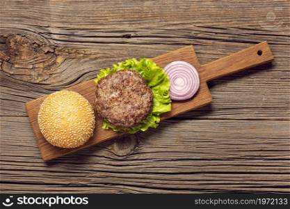 flat lay burger ingredients cutting board. High resolution photo. flat lay burger ingredients cutting board. High quality photo