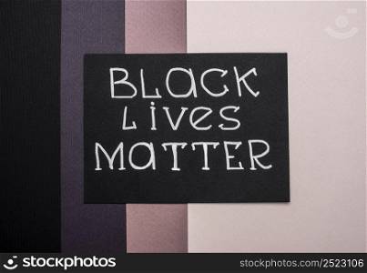 flat lay card with black lives matter multicolored paper