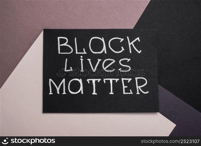 flat lay card with black lives matter slogan
