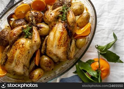 flat lay chicken with potatoes orange