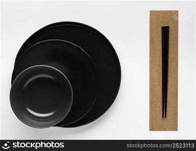 flat lay chopsticks with dinnerware