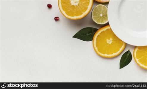 flat lay citrus with plate copy space