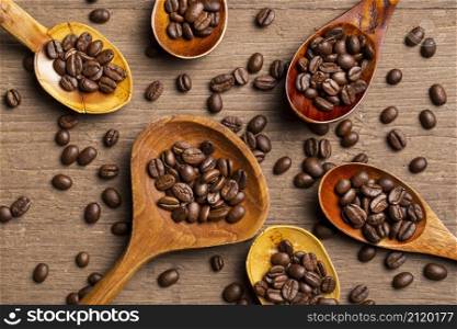 flat lay coffee beans wooden spoons