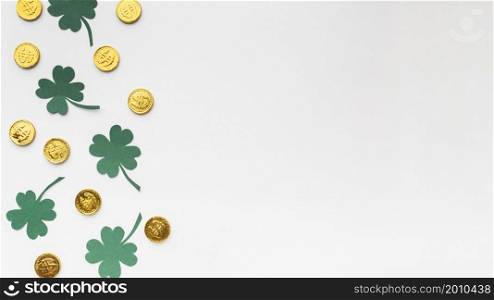flat lay coins clovers frame