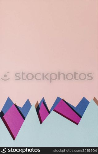 flat lay colorful paper pink background