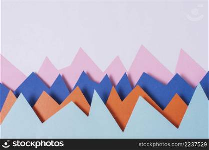 flat lay colorful paper purple background